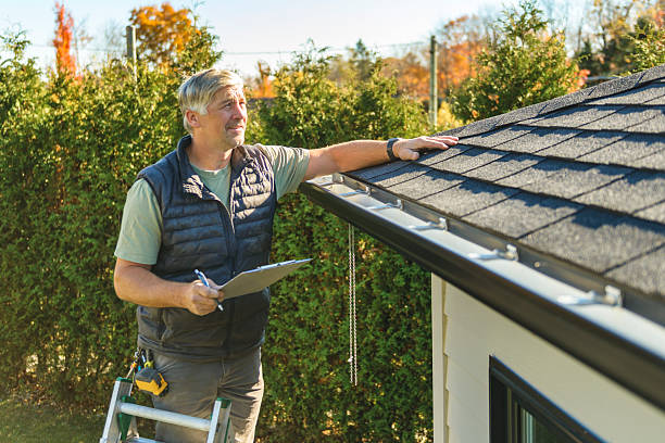 Professional Roofing technician working in Crownsville, MD